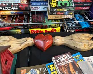 Craved out of wood and signed by artist