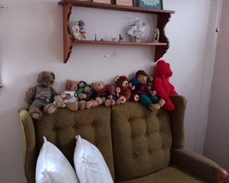 Lots of cute shelves, loveseat and teddy bears