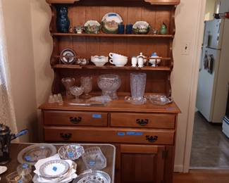 Hutch with antique dishes and cut glass