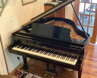 Vintage Steinway baby grand piano. Has a few technical issues (don’t we all at that age? ), but still sounds pretty good and looks great. Priced to go!