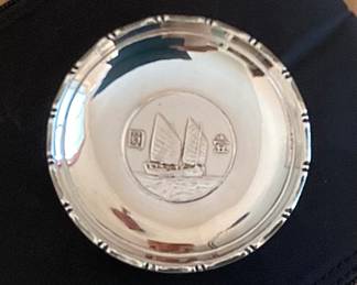 Chinese silver dish featuring a 1934 SunYat-sen “Junk Ship” dollar