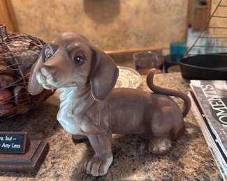 This precious puppy is a music box!