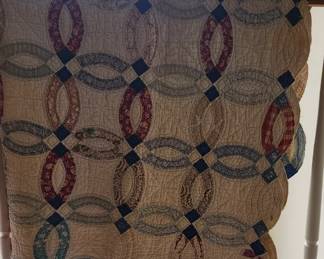 Beautiful 1950's hand pieced. Hand quilted Double Wedding Ring full size quilted. Noted attached from family records.