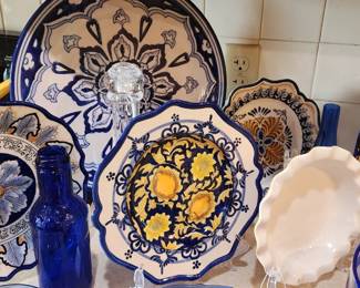 Several hand painted plates & platters