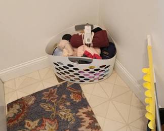 Laundry basket full of like New seating pads
