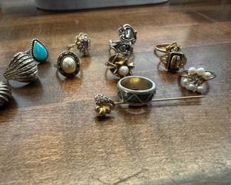 Sterling rings, two with turquoise, one with pearl and Marcasite, and three plain. One Gold with diamonds heart stick pin, two gold and pearl, one with amethyst and seed pearls. All small size Size 5 and 6.