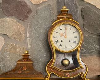 Swiss clock with mantel 