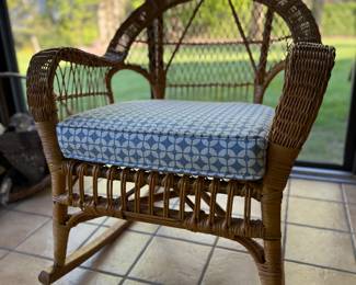 Wicker Rocker w/blue and white cushion