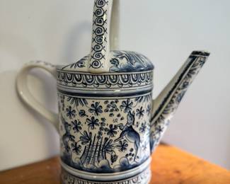 Hand-painted blue and white ceramic watering can
