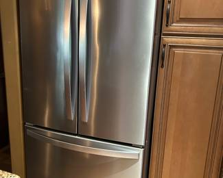 Whirlpool french door stainless refrigerator in excellent condition.