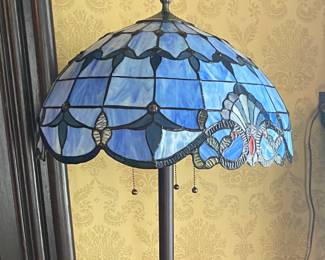Floor lamp with blue stained glass shade