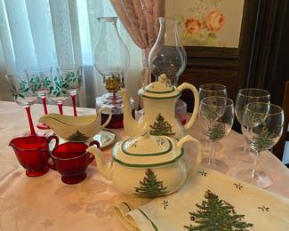 Oil lamps, four painted wine glasses with holly, red glass creamer & sugar
Spode: coffee pot, teapot, gravyboat w/tray, 4 wine glasses & 4 Christmas napkins.