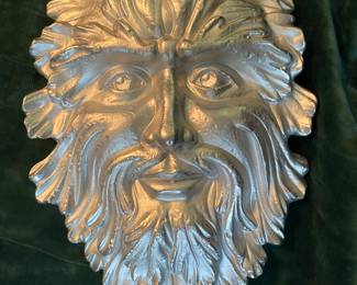 Green-man plaster wall hanging