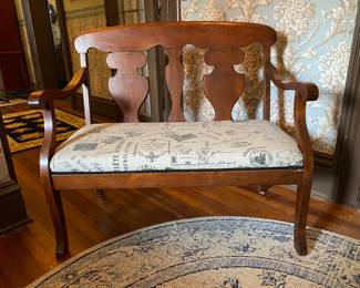 Antique settee with contemporary upholstery