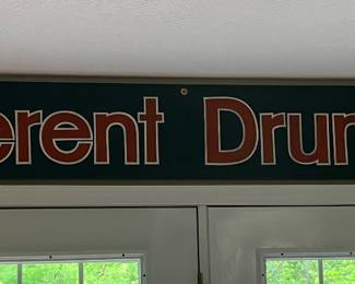 Vintage wooden store sign