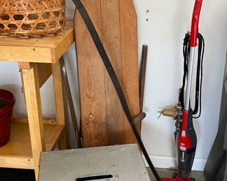 Vintage voters ballot box, antique ironing, board, and sickle