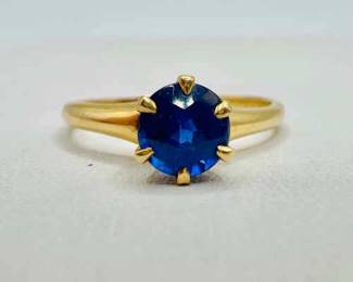 14K Gold Ring with Sparkling Blue Solitaire