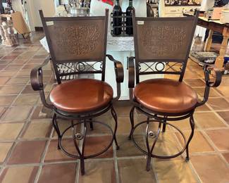 PAIR OF IRON BAR STOOLS