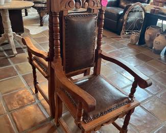 PAIR OF HAND-CARVED SPANISH ARMCHAIRS w/ LEATHER SEATS & BACKS!
