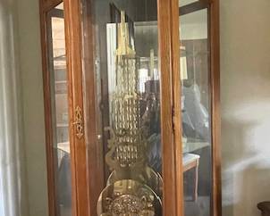 Howard Miller grandfather clock with shelves