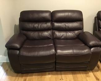 Leather reclining loveseat