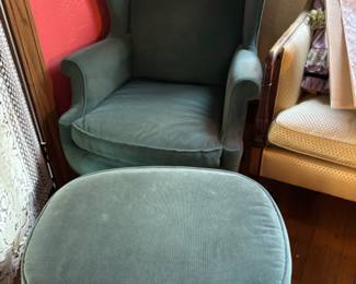 Green living room chair and ottoman