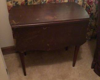 drop leaf side table (need refinishing) $90.