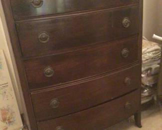Curved front chest of drawers