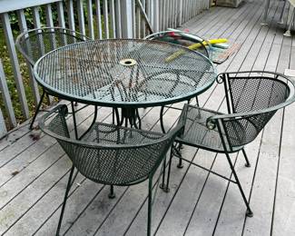 #46 Green Wrought Iron Table w/4 Green Wrought Iron Chairs - 42x29 $100.00