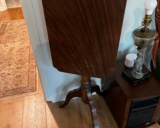 #119 flip top table pedestal table $50.00