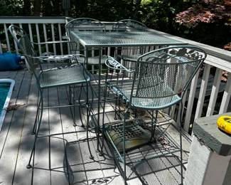 #25 Green Wrought Iron Tall Table w/4 chairs w/Umbrella Base - w/3 cupholders underneath the top - 26x36x42T Chair Height - Barstool is 30.5"Tall $175.00