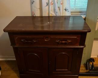 #123 antique end table with 1 drawer and 2 doors 22x16x29 $175.00