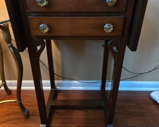 Two drawer drop leaf vintage table with glass knobs