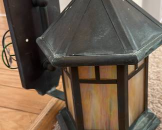 Hand crafted Stone Manor Canterbury estate porch lantern 6 sided iridescent stain glass panels. There is a set of 4