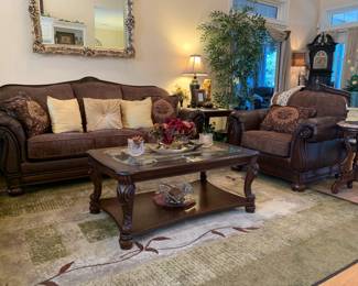 Faux leather and cloth sofa and chair, wooden and glass coffee table