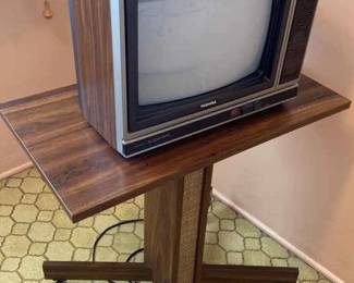 Toshiba TV, Insignia DTV Tuner, And A TV Stand