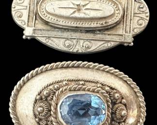 Two Oval Silver Brooches