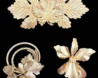 Three Gold Tone Brooches