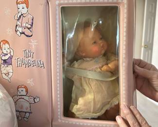 tiny Thumbelina doll with case