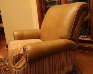 Leather and corduroy reclining armchair (two available) ($500 each)