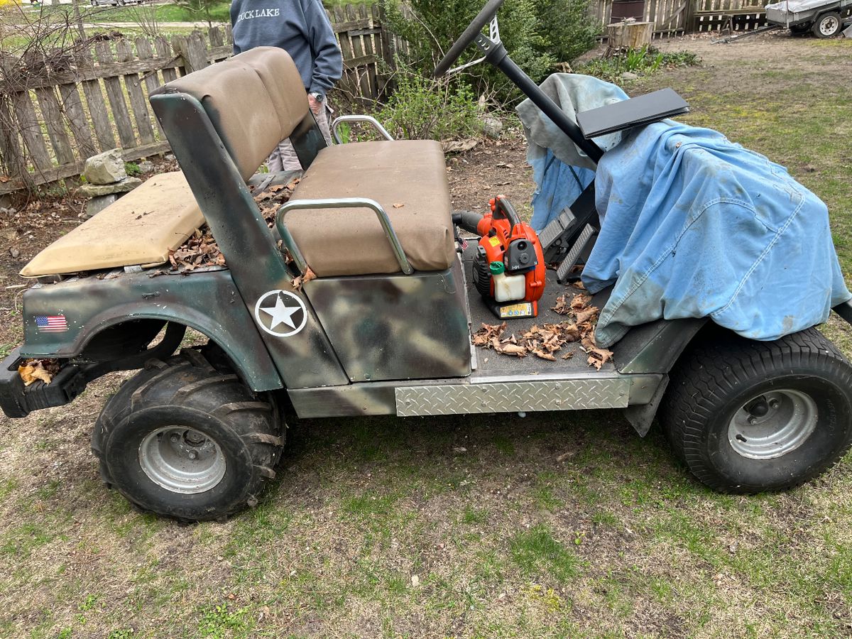 Vintage golf cart in running condition.