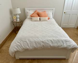 Full size bed from Rooms to Go and the bedding is from West Elm