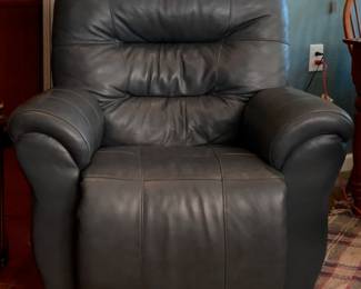 Blue Leather Recliner. Like NEW! Purchased about 3 years ago from Howell Furniture in Beaumont TX.
