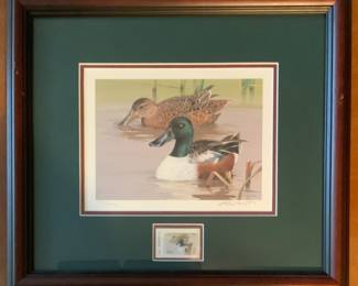 1994 Texas Waterfowl Duck Stamp Print by Ken Carlson, featuring two Northern Shoveler ducks. The print is Matted and framed accompanied by a matching stamp and is a limited edition piece complete with certificate. (18 1/2” x 16 1/2”)