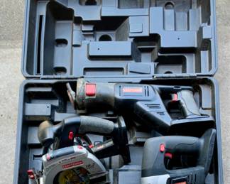Craftsman 19.2-volt cordless power tools in a black carrying case. Reciprocating Saw, Circular Saw and Jigsaw