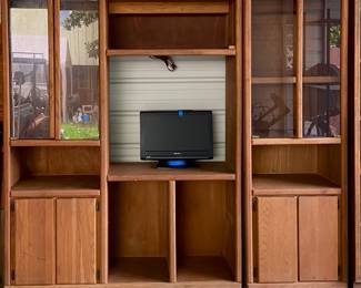 Oak Entertainment Center. 2 Section with Glass Front and Solid DoorsOverall (80”W x 17”D x 71.5”H)