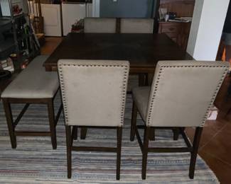 Counter Height Dining Room Set 6 (pcs): Table 4 Upholstered Nails Studded Chairs & Bench. Center of Table has a Set-in Lazy Susan TurnTable
