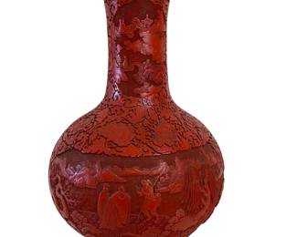 Lot #11 - 23in Cinnabar Vase with intricate detail of a Dragon rider and horse rider battle imagery https://denveronlineauctions.com/auction-details?id=1329886