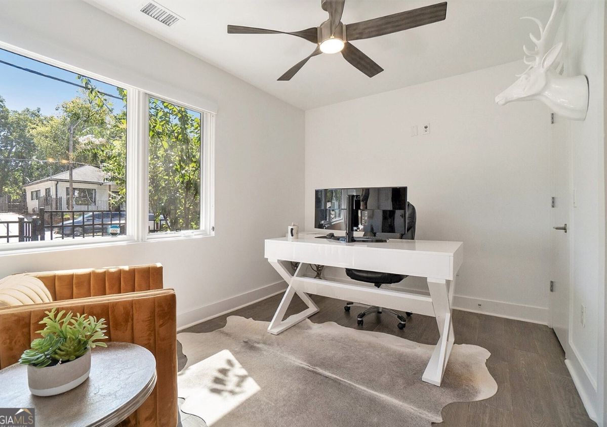 Cowhide Rug and Modern Desk