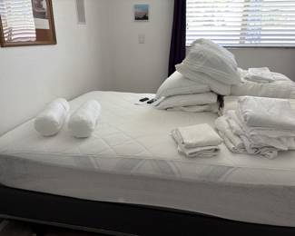 Queen bed, frame, multiple sheet sets